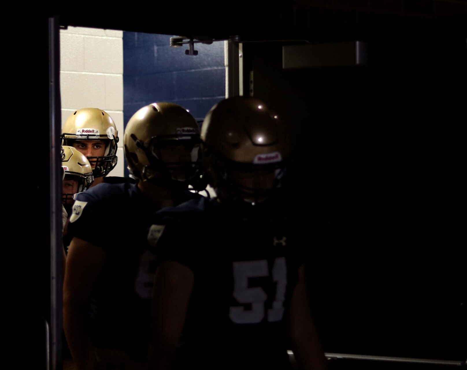 Helias players leave the locker room after halftime